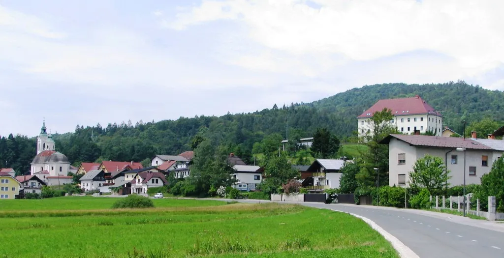 Dobrova with parish church at left