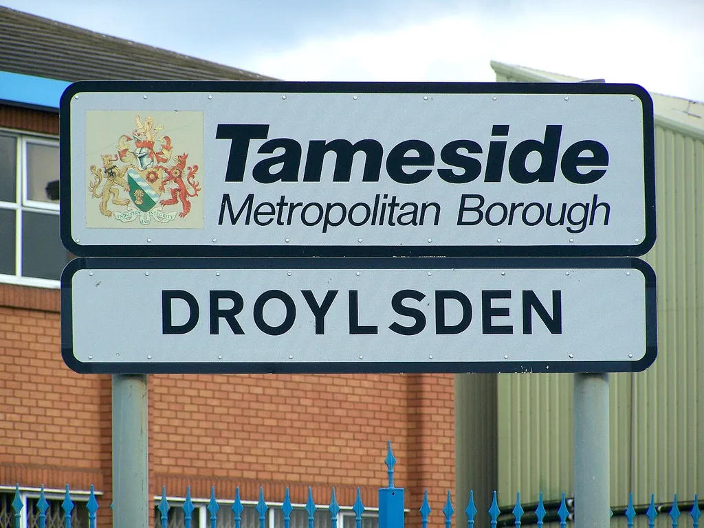 Welcome sign at Droylsden, in Tameside, Greater Manchester, England.