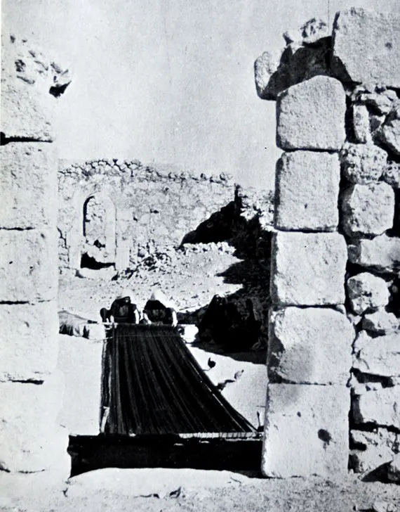 Dura, Palestine, 1930s. Women weaving carpet.