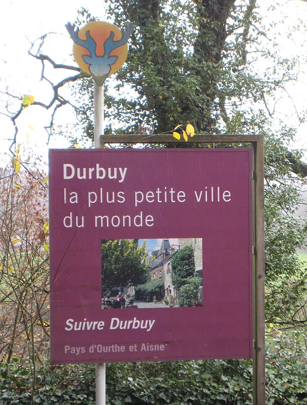 Sign on the road entering Durbuy describing it as la plus petite ville du monde - the smallest city in the world