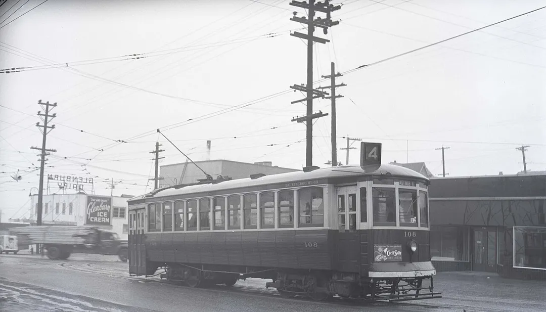 Photograph of car 108 at Hastings Street and Boundary, Vancouver, operating on the No. 14 Hastings East - Dunbar Line. The Glenburn Dairy is present in the background.