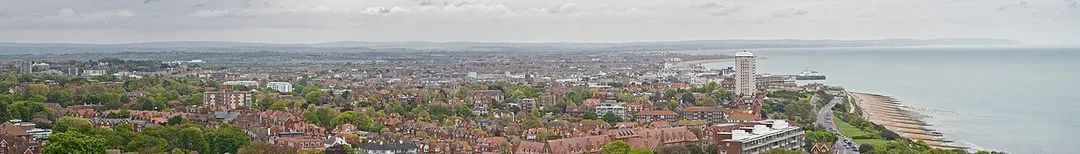 A panoramic view of the town of Eastbourne, United Kingdom, as viewed from the South Downs along the coast. Taken as a stitched panorama of 10 segments with a Canon 5D and 70-200mm f/2.8L lens at 135mm.