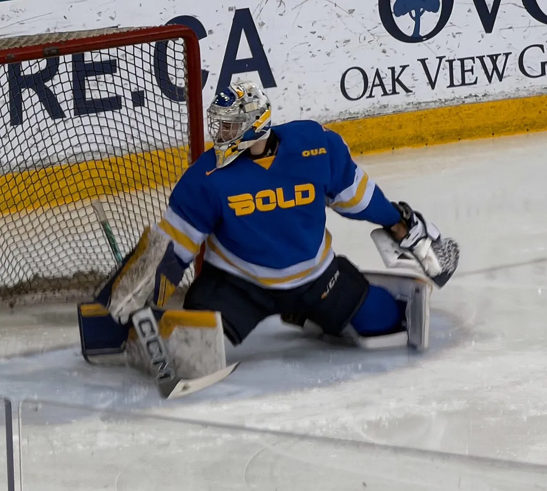TMU Bold goalie Kai Edmonds warms up before Game 1 of the 2026 OUA men's hockey quarterfinals against the Brock Badgers
