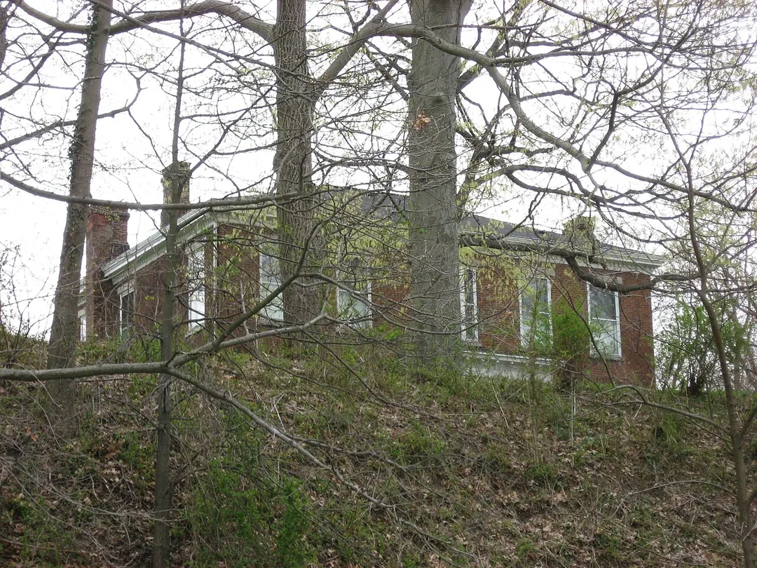 View through the trees of Elmhurst, located at 1606 Pleasant Avenue in Wellsburg, West Virginia, United States.  Built in 1848, it is listed on the National Register of Historic Places.
