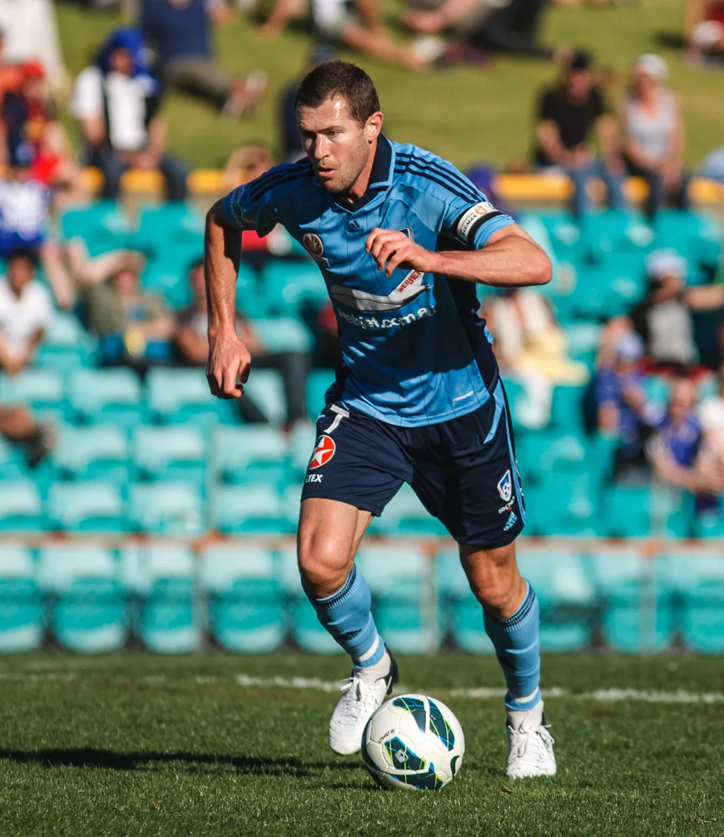 Brett Emerton playing in a pre-season match between Sydney FC and Newcastle Jets.