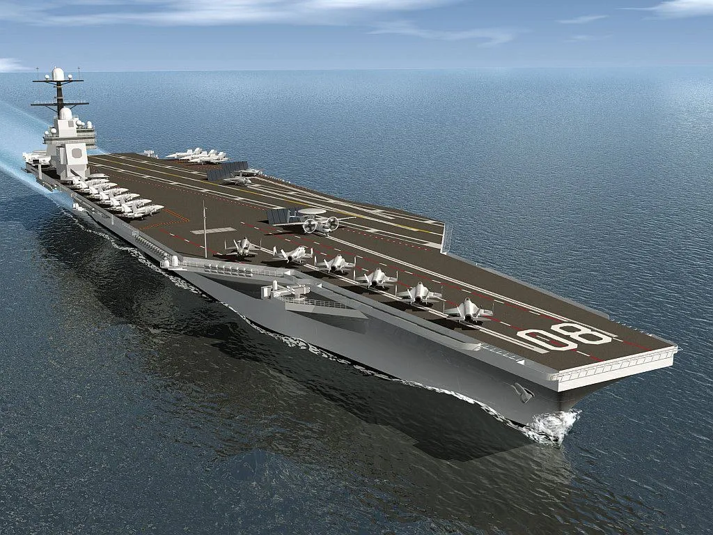 A graphic showing what the future USS ENTERPRISE (CVN 80) is expected to look like when she joins the fleet after 2025. The aircraft are F-35C Lightning II Joint Strike Fighters, F/A-18 E and F Super Hornet strike fighters, E-2D Hawkeye electronic warfare planes, and an unmanned strike jet modeled on the X-47B sitting on the No. 4 catapult. Pennant number orientation on flight deck has been corrected.