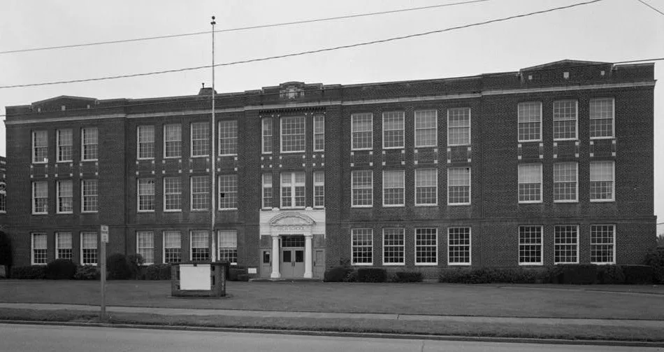 This is the old Enumclaw High School on Porter Street in Enumclaw, Washington, USA.  Originally constructed in 1921, and modified in 1928, 1935, 1938.  This building no longer exists; it was demolished in the 1990s.