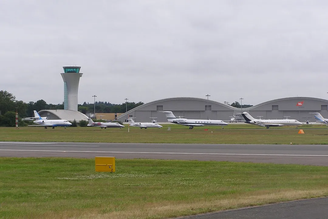 A line-up of business jets at Farnborough Airfield, England