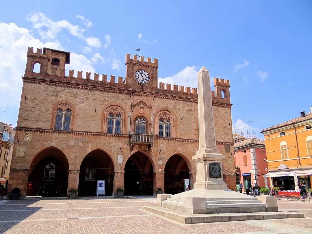 The Town Hall of Fidenza, with the Garibaldi Obelisk, on the Piazza Garibaldi. Via Francigena passes across this town square.
