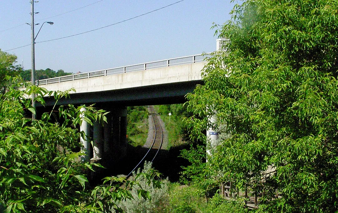 View of Don Mills Road over CNR and pedestrian trail in Toronto, Ontario, Canada.