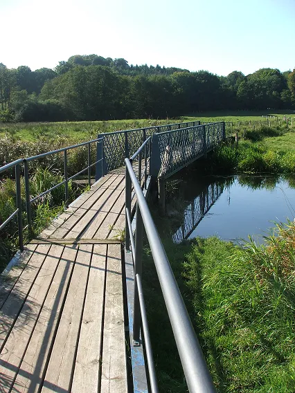 1865 Iron Bridge crossing the river Eider in Techseldorf, Germany.