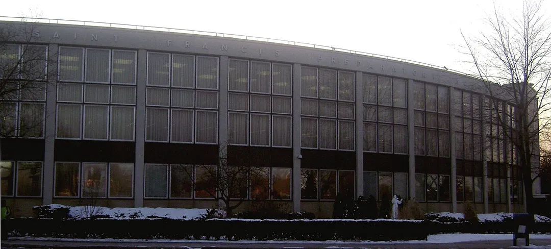 A Photo of the Catholic co-ed High School St. Francis Preparatory School, often shortened St. Francis Prep, located in Fresh Meadows, New York, United States. The building housed Bishop Reilly Diocesan High School from 1962 until 1974, the year it was purchased by Franciscan friars to house St. Francis Prep. See also File:Francis Prep shady jeh.jpg.