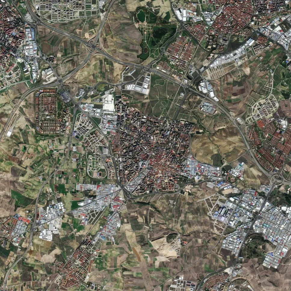 The diverse landscapes of the autonomous Community of Madrid in the heart of Spain are evident in this week’s image.
The community and country’s capital city is visible near the centre of the image. Zooming in, we can see the Buen Retiro park just east of the city centre with its large, artificial pond. About 3.5 km due north sits the Santiago Bernabéu football stadium. Southeast of the stadium we can see another circular structure: the Las Ventas bullfighting ring.
In the upper left corner of the image is the El Pardo mountain and protected natural park, which is popular for mountain biking.
The other areas surrounding Madrid are blanketed with agricultural structures. East of the city are large fields along the Jarama river, and more areas of agriculture appearing brown further east still.
This image, also featured on the Earth from Space video programme, was taken by the Sentinel-2A satellite on 16 November 2015.
Launched in June 2015, Sentinel-2 can map changes in land cover such as forest, crops, grassland, water surfaces and artificial cover like roads and buildings in cities.
Early results from the mission on mapping changes in land cover are expected to be presented at the upcoming Living Planet Symposium, held in Prague in May. The event brings together scientists and users to present their latest findings on Earth’s environment and climate derived from satellite data.