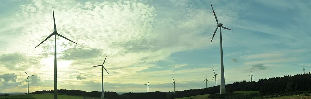 The entire wind farm near Gebhardshain and Fensdorf. Seven Nordex N90, in the right side of the image more in the background, two Enercon E66, the two in the middle with the red-white rotor-blades and the new wind turbines in the left side - two Enercon E53.