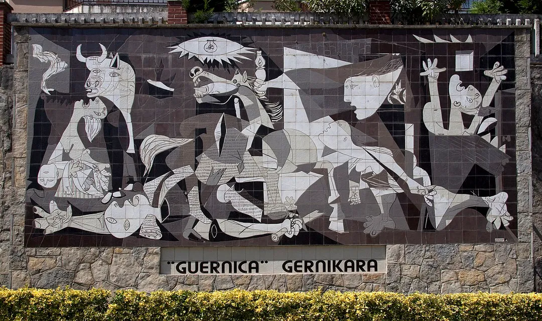 Guernica is infamous for the first use of the Luftwaffe's bombing force against a town and Picasso's famous painting. After such a long time there is little evidence of the bombing but there is this large tiled version of the painting