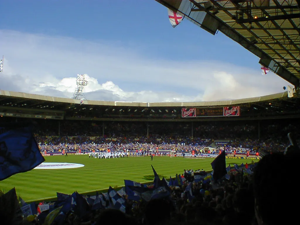Gillingham fans at the 2000 Division Two play-off final. Gillingham fans waving banners before the match. The first play-off final of the 1995–96 season was bathed in sunshine.