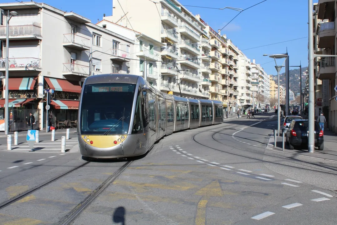 Alstom Citadis 402 tram no. 28 of Lignes d'Azur operating on Nice tramway Line 1, at Boulevard de Gorbella / Rue Puget / Square Roger Boyer in Nice, France.