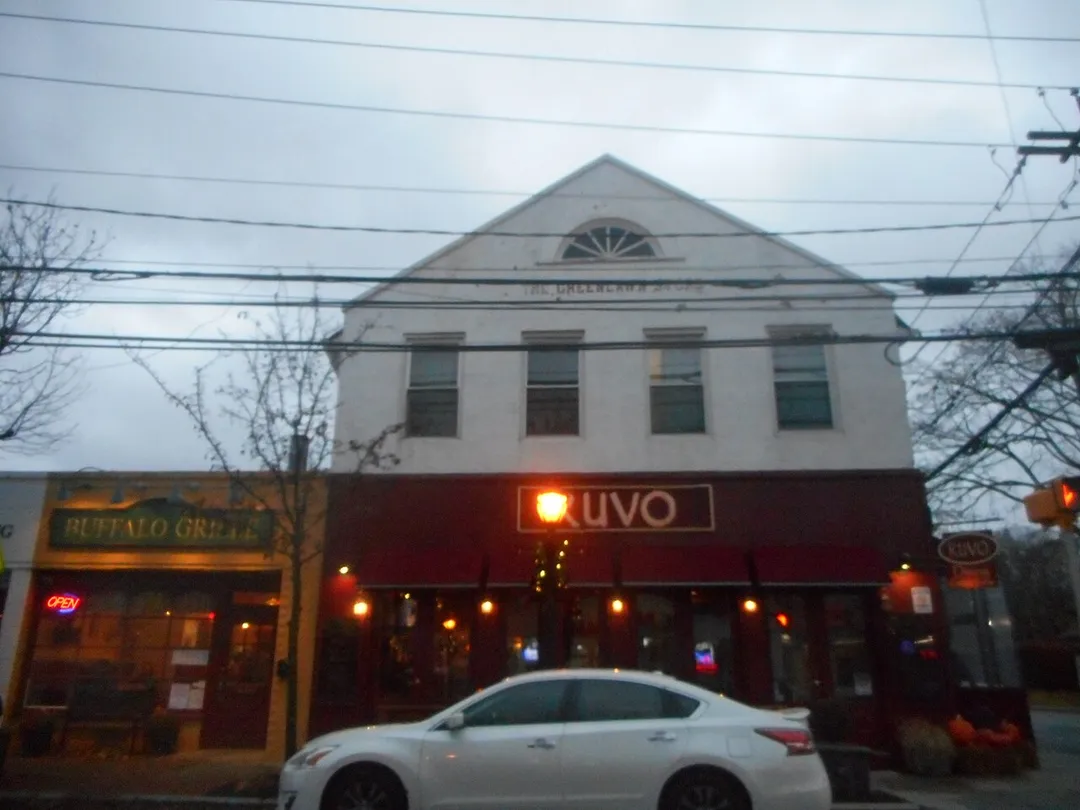 The Greenlawn Store, a long-standing commercial building on the southwest corner of Broadway (Suffolk County Road 86) and Smith Street in Greenlawn, New York. The building is a two-story commercial building, possibly part residential that appears to date back to the early-20th Century.