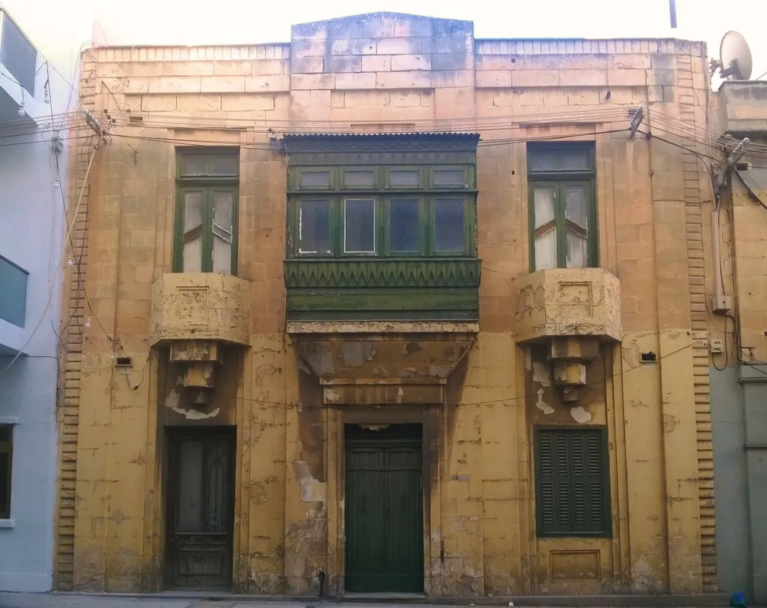 Art Deco House in Gzira. In Rue d'Argens, Gżira, (block 326-306), known as 'Jeanne 312', a double front dwelling built in the interwar period. It was designed by architect Prof Joseph Colombo as his private residence and shortlisted for the first architectural awards held in 1936. Malta's Planning Authority gave it Grade 2 protection status, saying the building’s elevation was exceptional in the way that the traditional townhouse had been reinterpreted in a modernist style making use of strong geometric motifs
