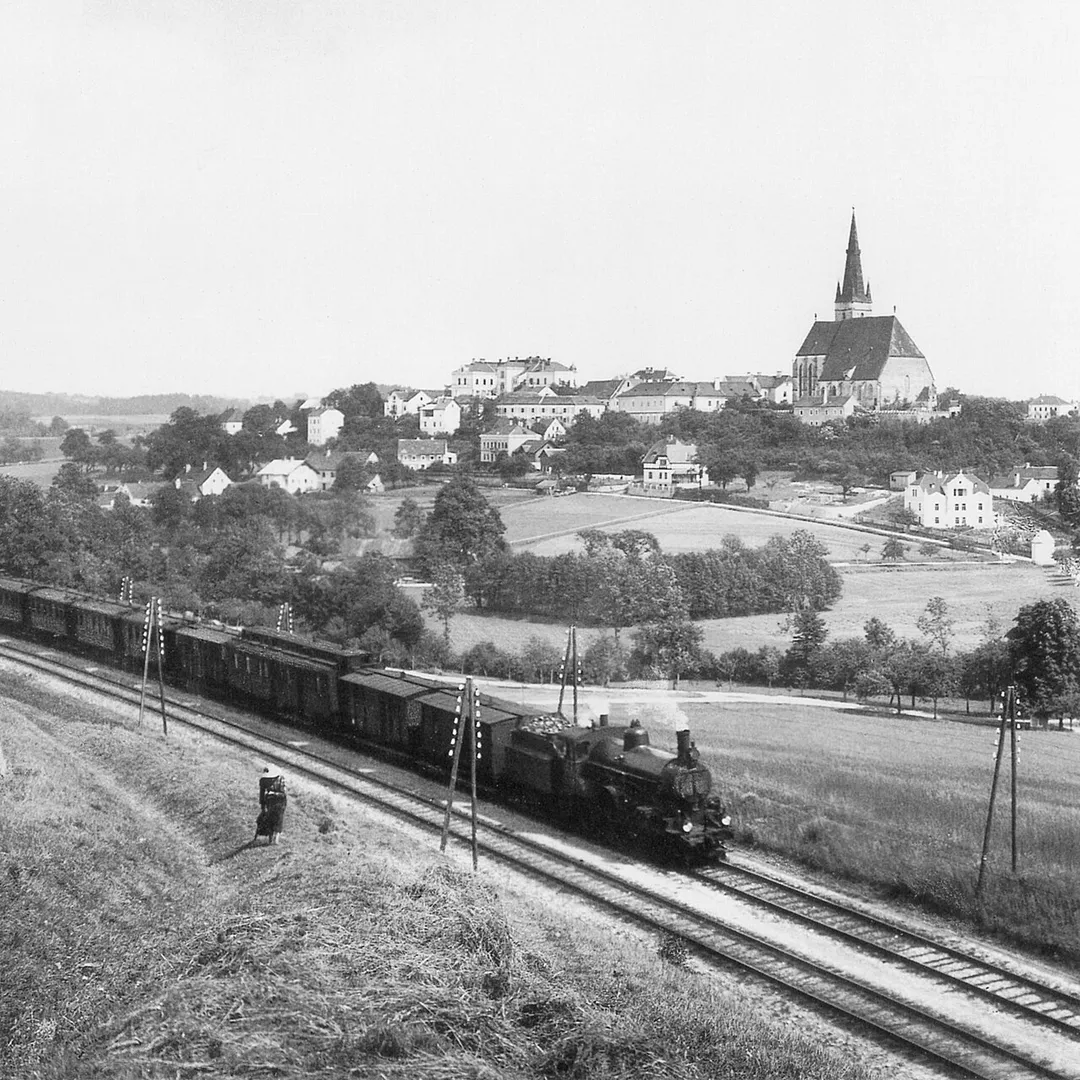 Passenger Train with class 206 engine passing the small town of Haag, Lower Austria