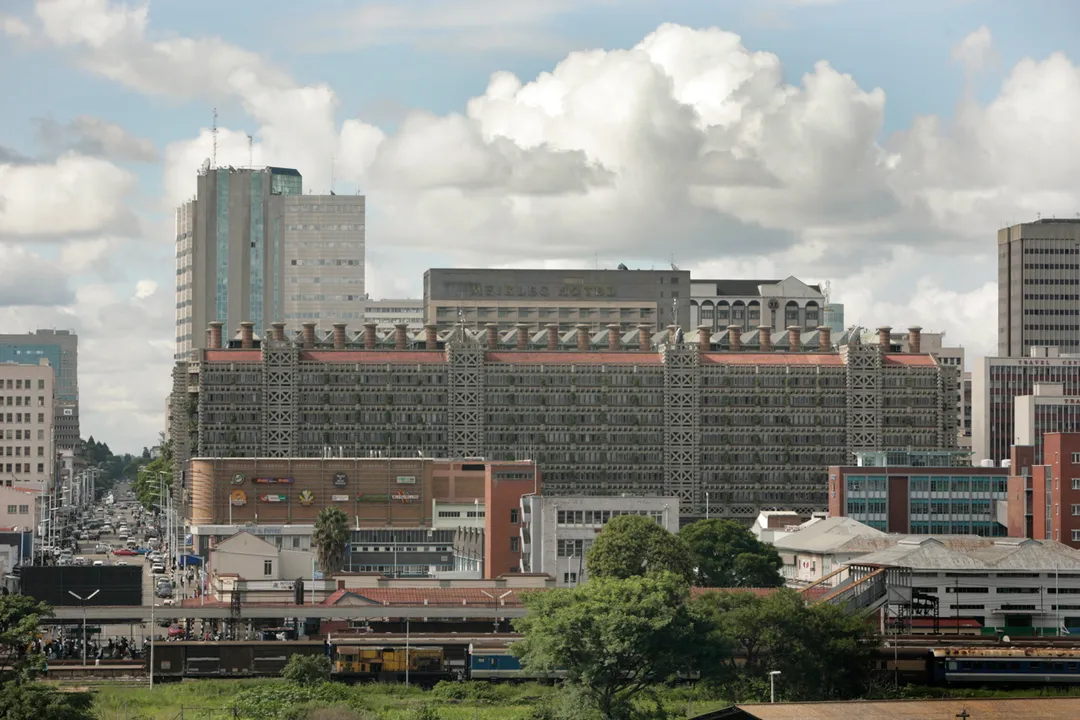 Eastgate Centre, Harare, Zimbabwe (foreground, the building with the large number of chimneys on top)