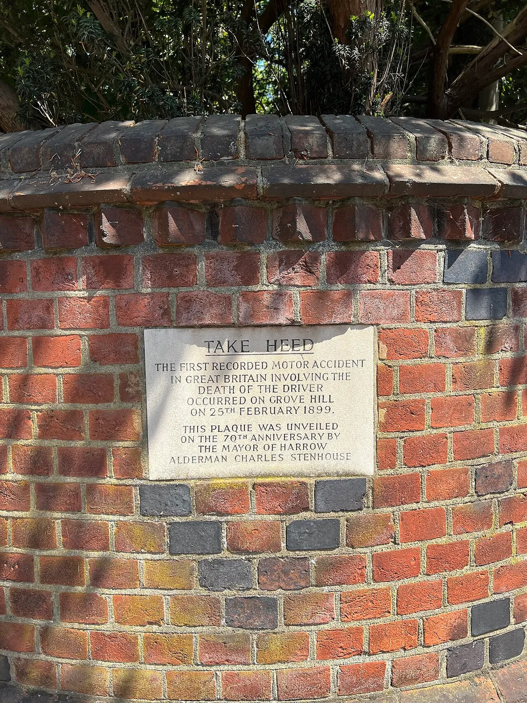 Plaque commemorating first motorcar fatality in Harrow-on-the-Hill, London.