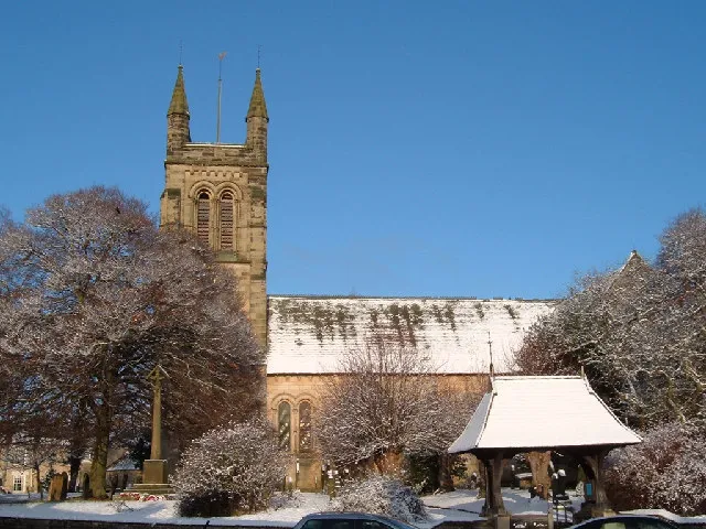 All Saints' parish church, Helmsley, North Yorkshire, seen from the south in snow