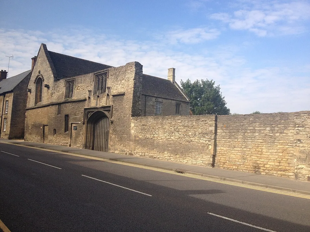 South range and remains of the east range of Chichele College, Higham Ferrers, Northamptonshire, seen from the northeast from College Street