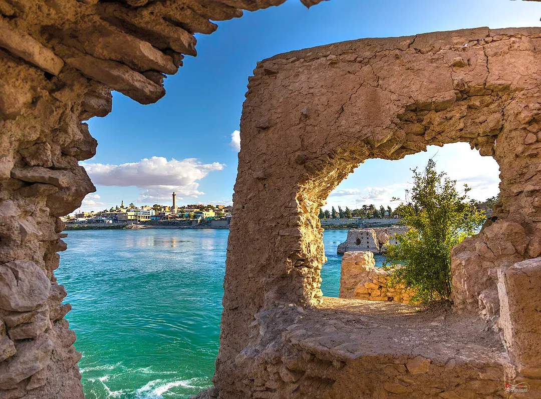 The picture is from the city of Hit, Anbar Governorate, includes three archaeological monuments, the first is the archaeological Hait, which dates back to 3000 years, &amp; the Euphrates mills in the middle of which were using the watering plantations and mills in grinding grains, depending on the strength of the Euphrates River flow, the last of which