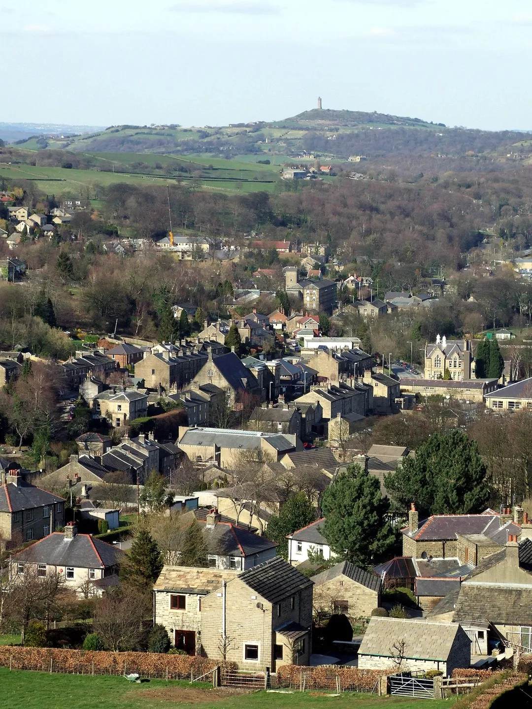 View across Holmfirth to Castle Hill, Huddersfield taken from Dunsley Bank Road