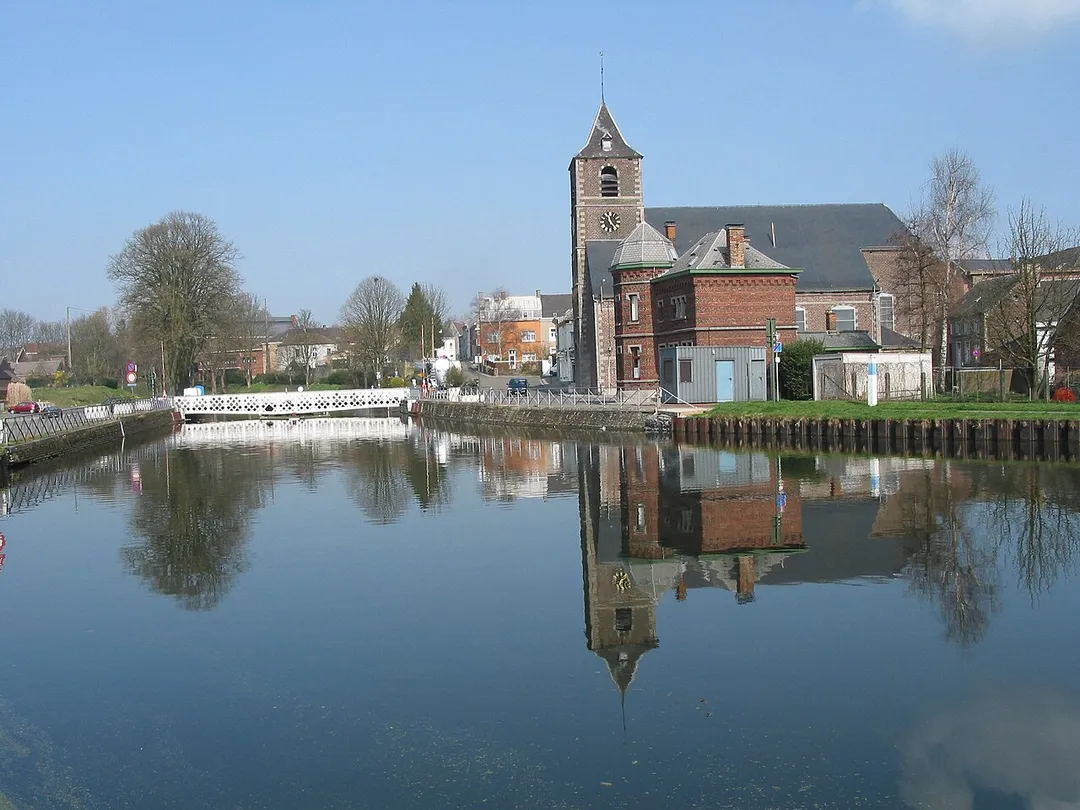 Houdeng-Aimeries  (Belgium), the « du Centre » canal, the swing bridge and the St. John the Baptist church (1779).