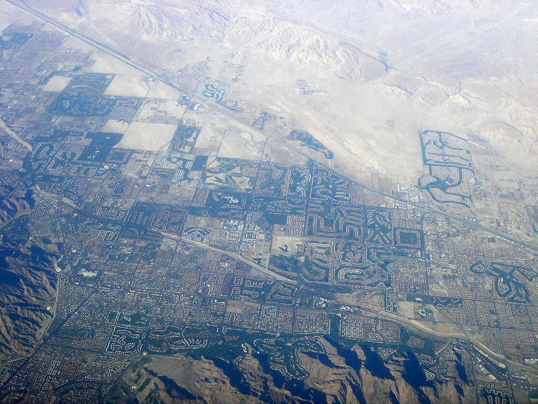 Let's get environmental, 3: Palm Springs pretty much exists because of groundwater sources. Green patches you see are golf courses and developments. The problem is that if I've understood correctly, PS takes far more water out from underground sources than what goes into them. Renewable they are, but not in the current rate of consumption. How long does this lifestyle continue before PS turns into another ghost town? 50 years? 100 years? Note also the difference between "old" PS (up, left) and newer Palm Desert (right). From the sky, PD's developments are clearly wasteful compared to PS's modest mid-century landscaping-trees-public-parks style.
