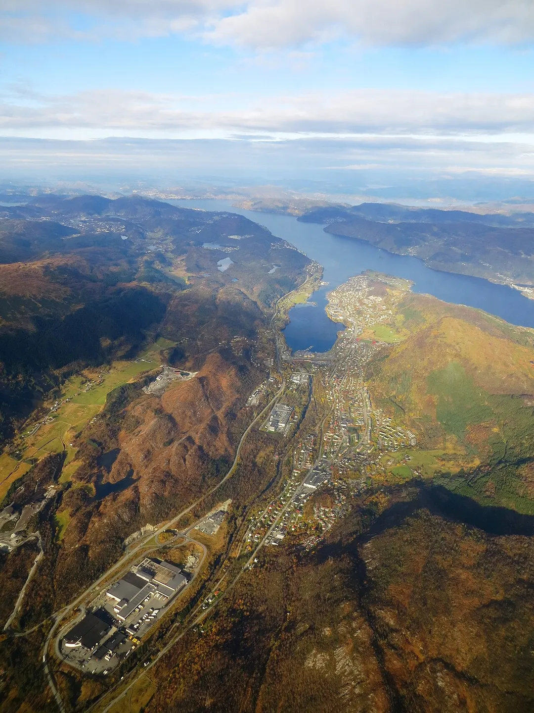 Indre Arna, an industrial town east of Bergen, in the municipality of Bergen by Sørfjorden inlet. Island of Osterøy in the background.