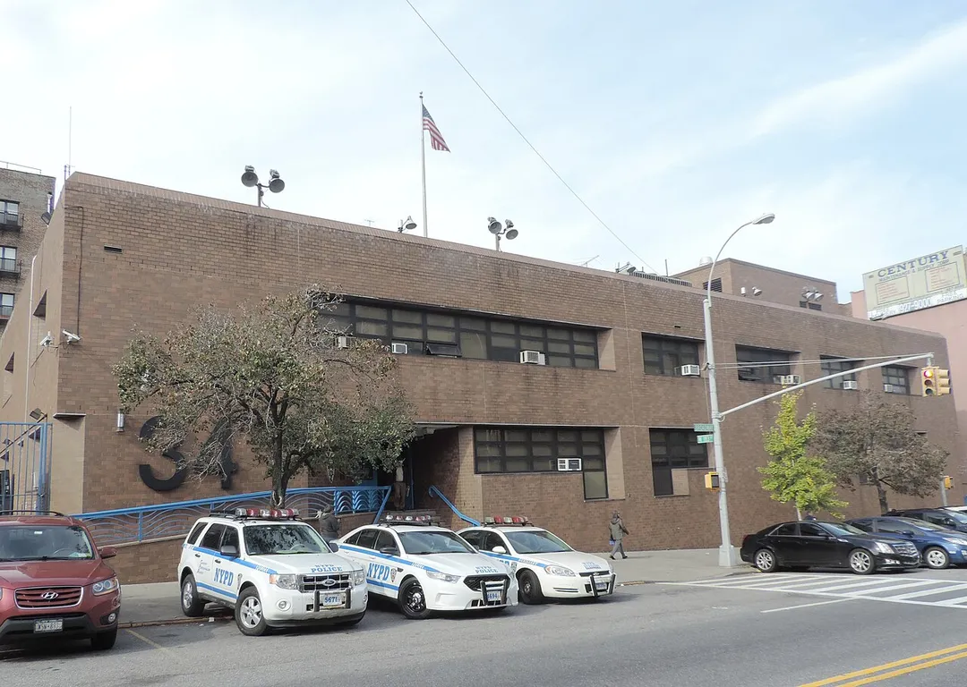 Looking north across Broadway at precinct house.