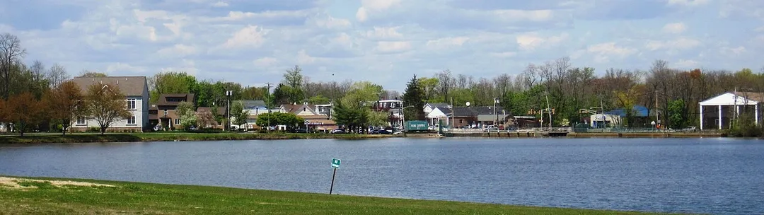 Photo showing Jamesburg as seen from Thompson Park (looking across Lake Manalapan).