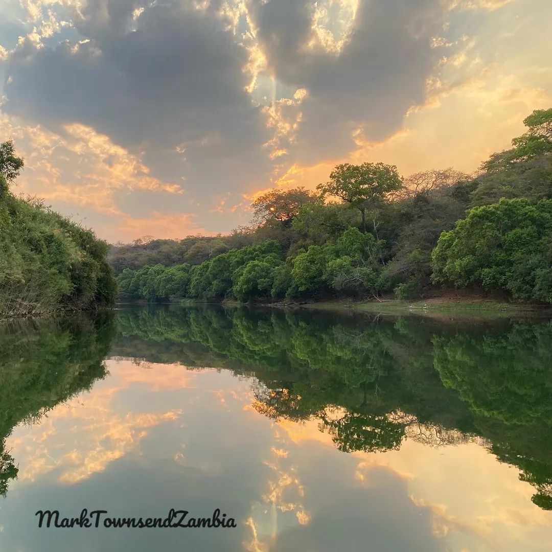 The calm waters of the Kabompo river at sunset. @MarkTownsendZambia