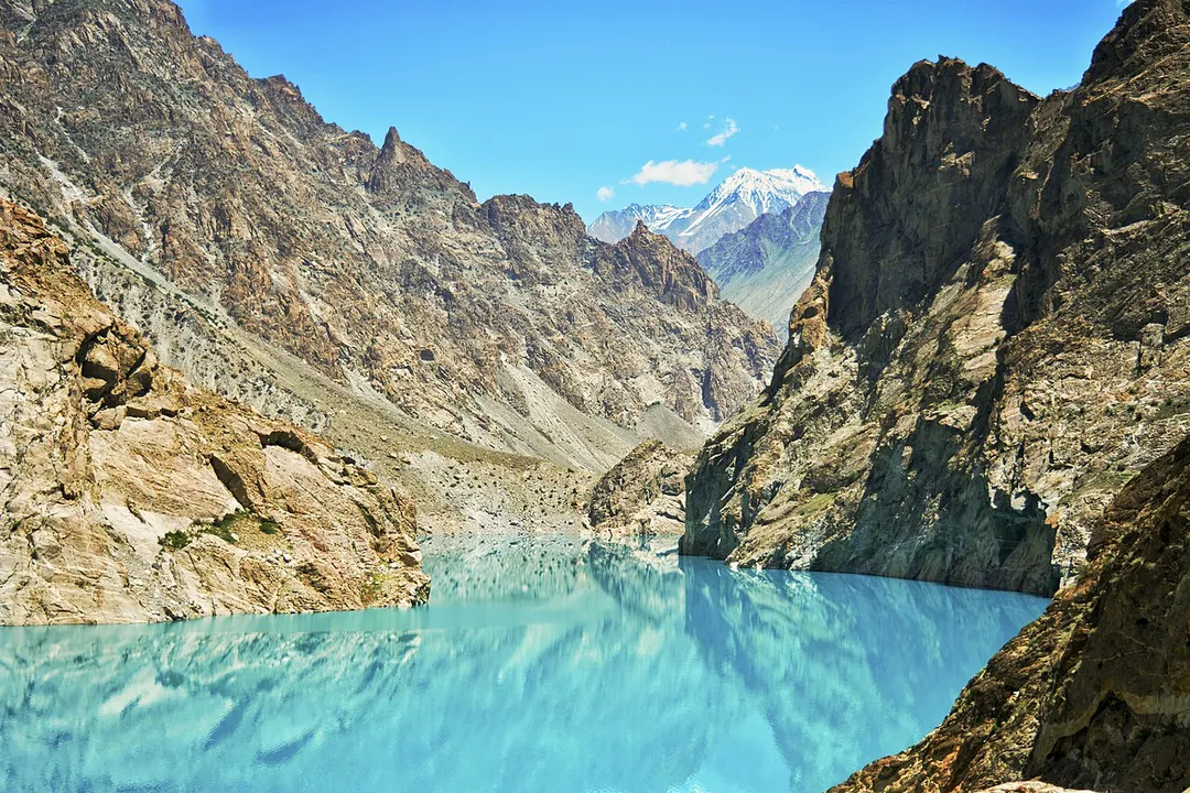 Attabad Lake also known as Gojal Lake is located near Hunza Valley, one naturally blessed part of northern areas of Pakistan. The lake gets its influx from Hunza River (2,800 cu ft/s).The maximum length of the lake is 13 miles (21 km) and the depth is 358 feet (109 m). The total water volume is 330,000 acre feet.
The accidental creation of Lake Attabad was due to the land sliding which had some severe consequences including the abandoning of several villages and mortality of twenty village inhabitants in 2010. Although, later on it turned out to be a blessing in disguise, presently it is a popular summer destination for tourists