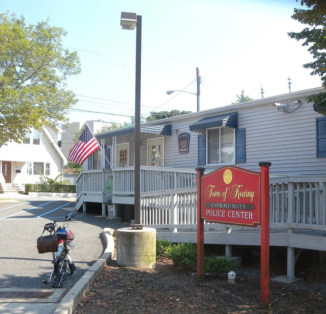 Looking southeast at Community Police Center on a sunny early afternoon. Bicycle is photographer's.