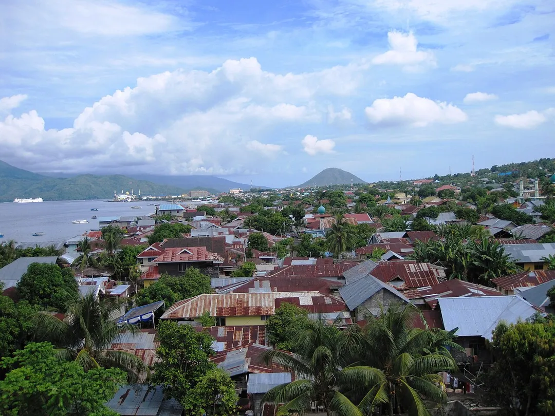 Ternate City, located on the island of the same name, is the former administrative centre of North Maluku Province, Indonesia. U.S. Foreign Service Liaison Officer Tom Weinz captures a photo as the USNS Mercy for Pacific Partnership 2010 arrives in Ternate, Indonesia, on July 18, 2010.