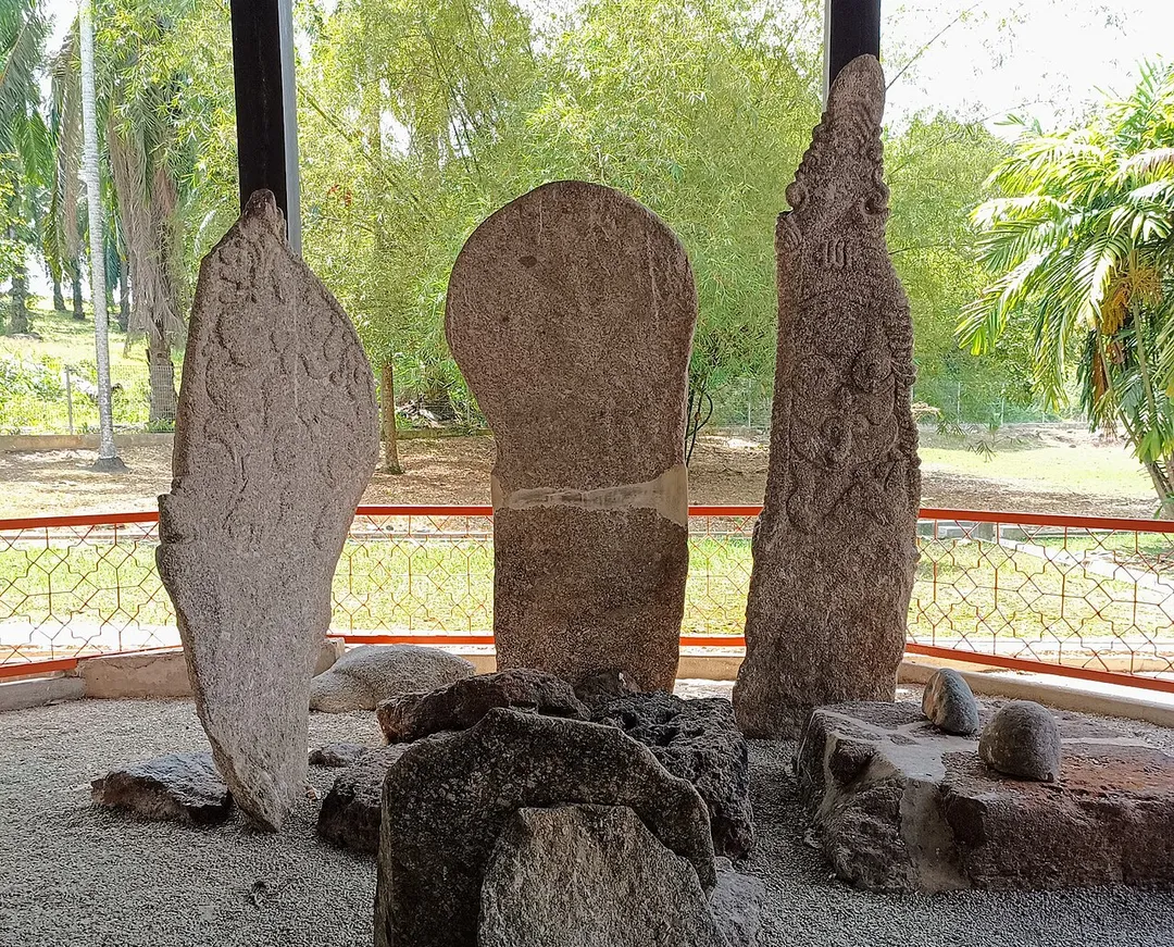 Three ancient standing stones in the Pengkalan Kempas historical centre, Negeri Sembilan, Malaysia