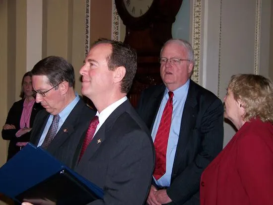 The Managers for the Impeachment trial of former US District Court Judge Samuel B. Kent are waiting to to take the Articles of Impeachment to the Senate. 

Caption provided by Congressman Jim Sensenbrenner's office: Taking Articles of Impeachment to Senate Congressman Sensenbrenner walks the Articles of Impeachment to the Senate