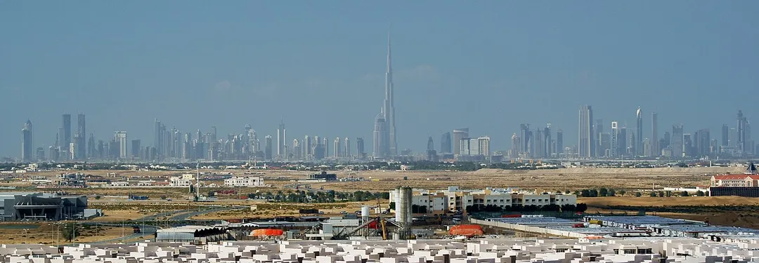 Burj Khalifa on its official opening day Jan 4th, 2010. The image was taken approx. 15 kilometers east of Burj Khalifa and includes several other 300m+ towers