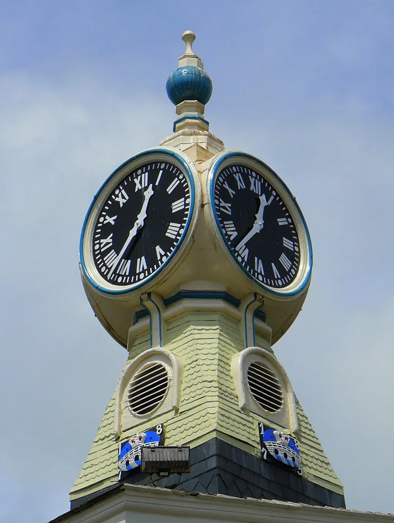 Clock on the top of the old Town Hall building in Kingsbridge, Devon, UK