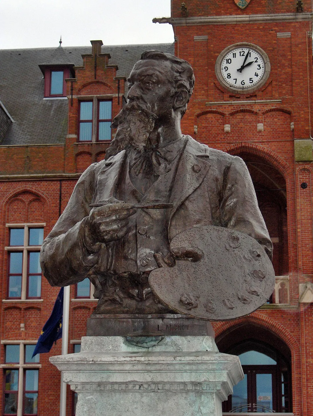 Bust of the painter Alfred Verwee by Leon Mignon (1896) in front of the neogothic town hall of Knokke-Heist, Belgium