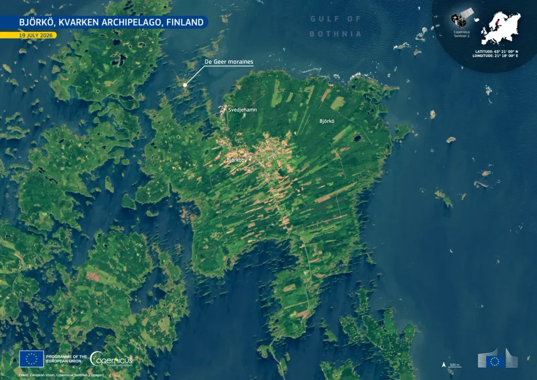 Björkö sits in Finland’s Kvarken Archipelago, part of a UNESCO World Heritage Site. Among the island's most distinctive features are the parallel De Geer moraines, a series of low ridges deposited as the ice sheet retreated at the end of the last ice age. This image, acquired by one of the Copernicus Sentinel-2 satellites on 19 July 2026, shows Björkö set among dark blue waters, shallow inlets, and numerous smaller islets. Dense forest appears in deep green across the interior, while lighter fields and clearings form long, narrow strips around Björköby and along the island’s road network. Svedjehamn, a historic fishing harbour on the north-western coast, provides access to nearby nature trails. Copernicus satellite data support regular monitoring of shoreline change, vegetation, and land use.