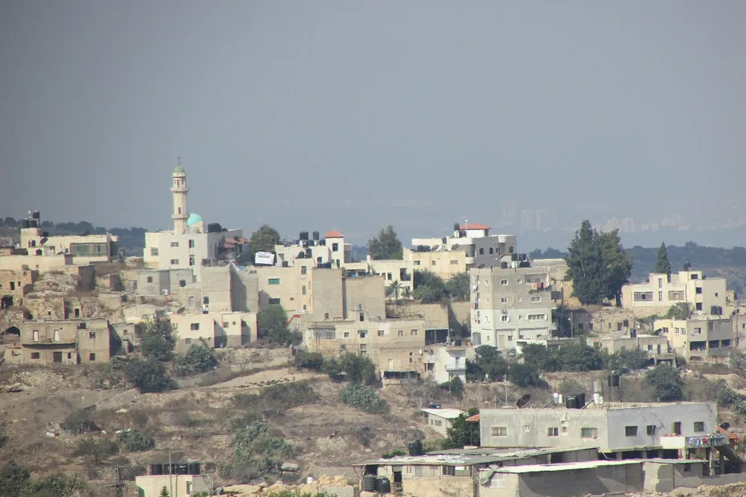 Central Kobar mosque. The closest house is in Burham. Taken from the east on route 465.