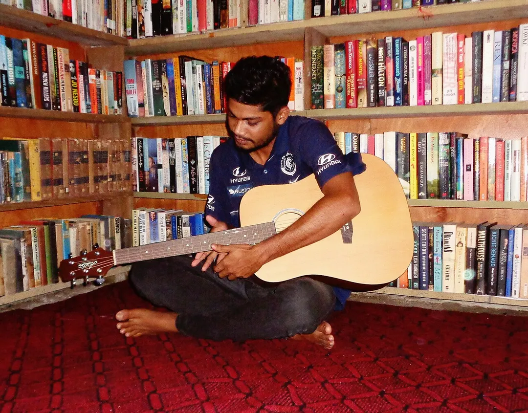 Yogesh Chandra with his guitar at his home in Labasa in 2021.