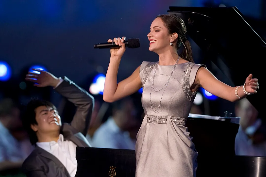 Singer Katherine McPhee and pianist Lang Lang perform at the National Memorial Day Concert in Washington, D.C., May 24, 2009.