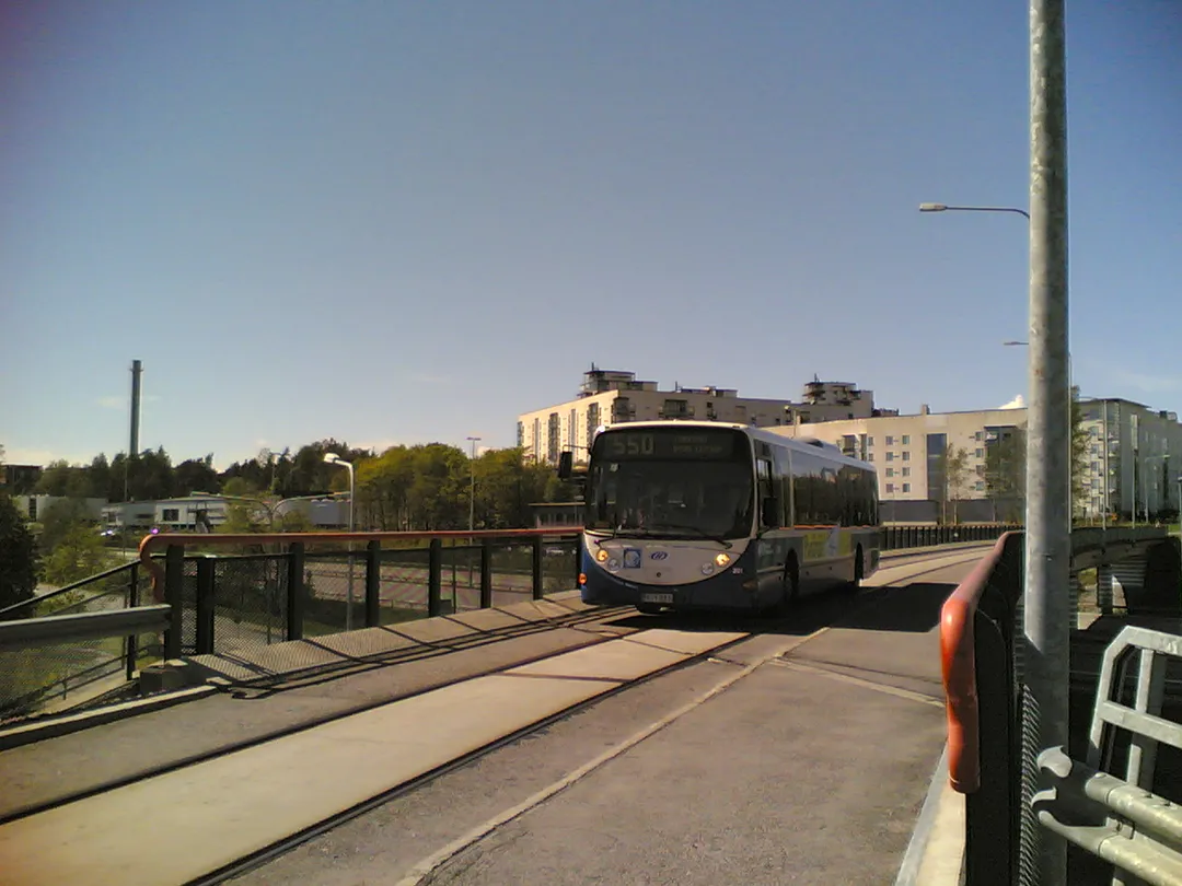 Line 550 Lahti Scala (with Scania L94UB chassis) bus (#301) on a bridge dedicated for public transport in Helsinki, Finland. Built 2003, Helsingin Bussiliikenne operator.