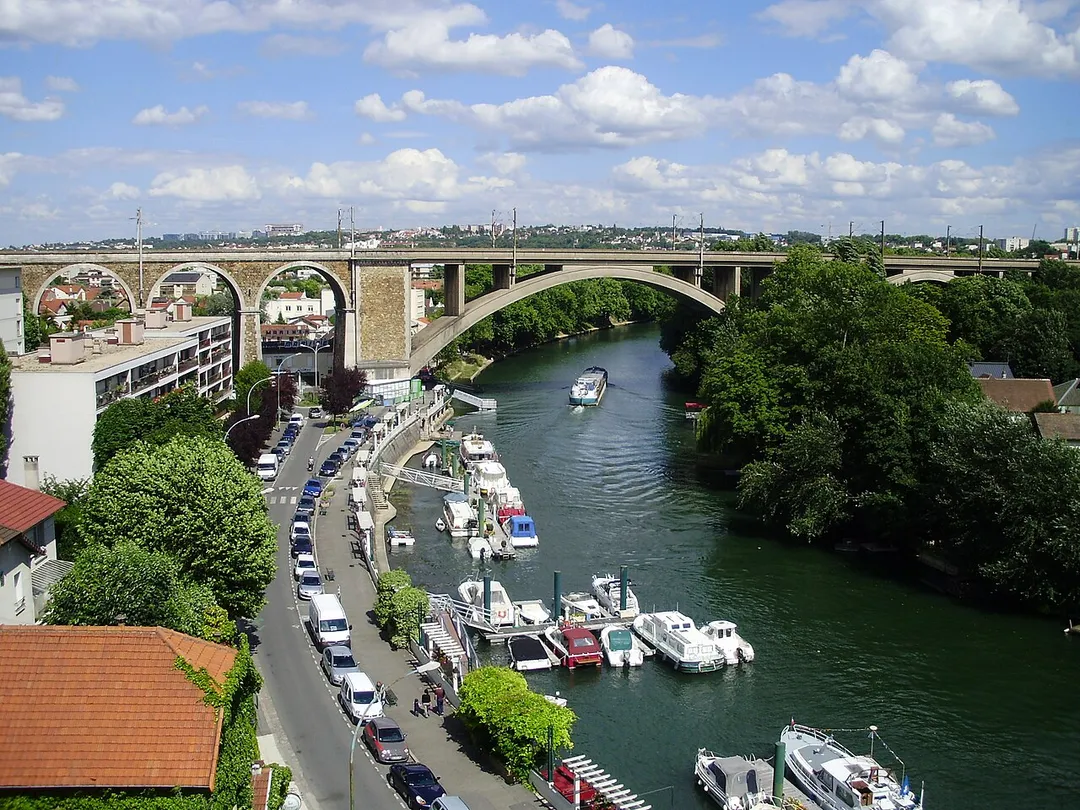 Railway bridge of Nogent-sur-Marne, Val-de-Marne, France, seen from the last store of a building situated on the quai du port (harbour embankment) in Nogent-sur-Marne
